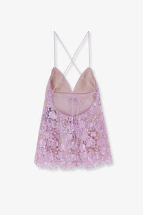 Back view of retrofete women’s kamala short dress in bronze with delicate lavender lace camisole and crisscross straps