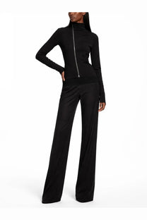 Black high neck zip front long sleeve top with sleek fitted silhouette paired with rick owens lilies black pants