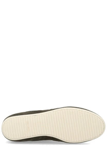 Olive green suede slip-on sneaker with white rubber sole and clarks logo embossed near the heel, shown from the back