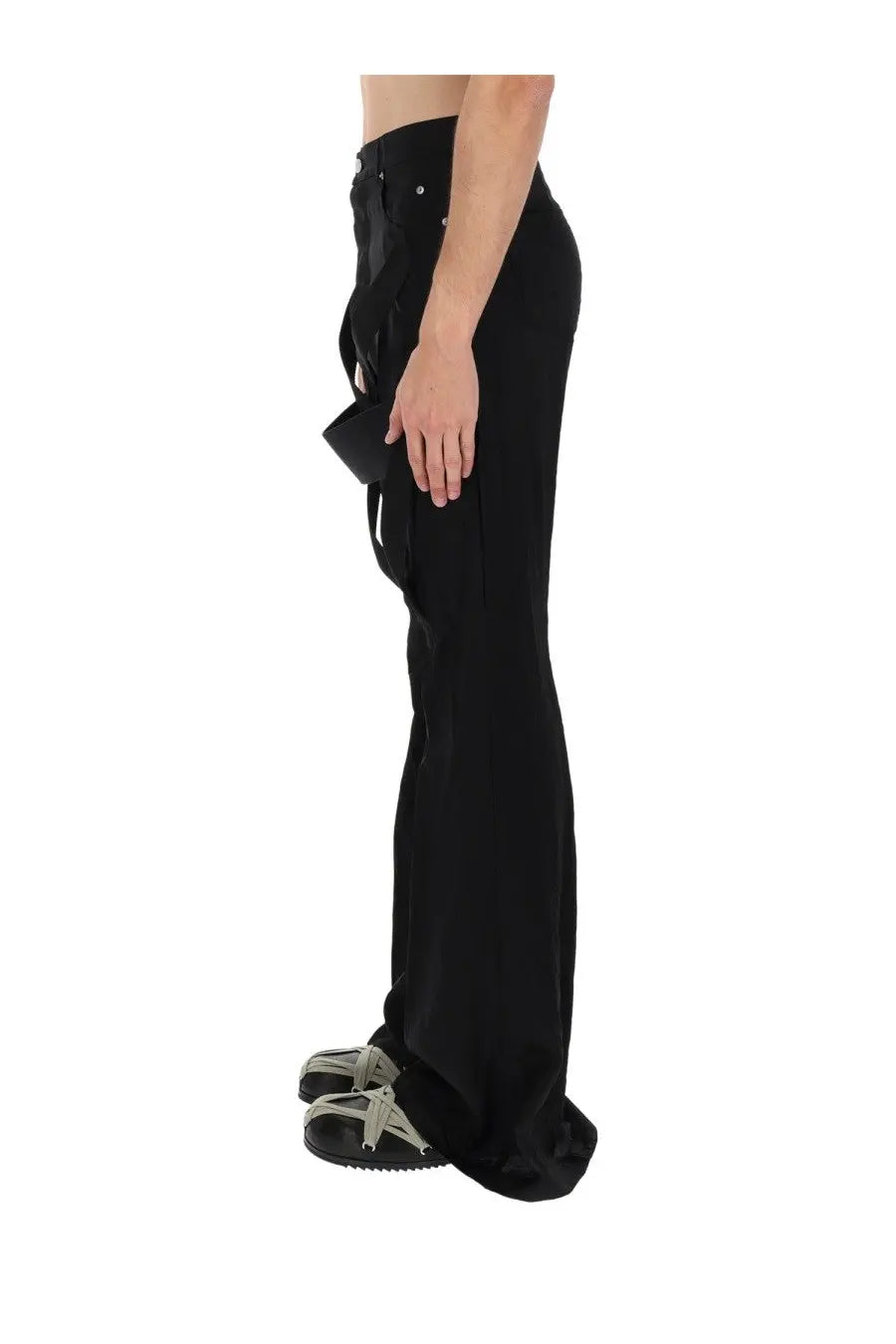 Rick Owens men’s black wide-leg pants with distinctive asymmetrical draped fabric panel on the side