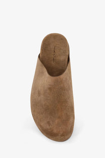 Rick Owens men’s brown suede sandals feature a tan suede slip-on mule design with a soft textured upper