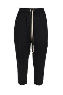 Rick owens women’s black tapered jogger pants featuring a contrasting cream-colored drawstring for casual wear