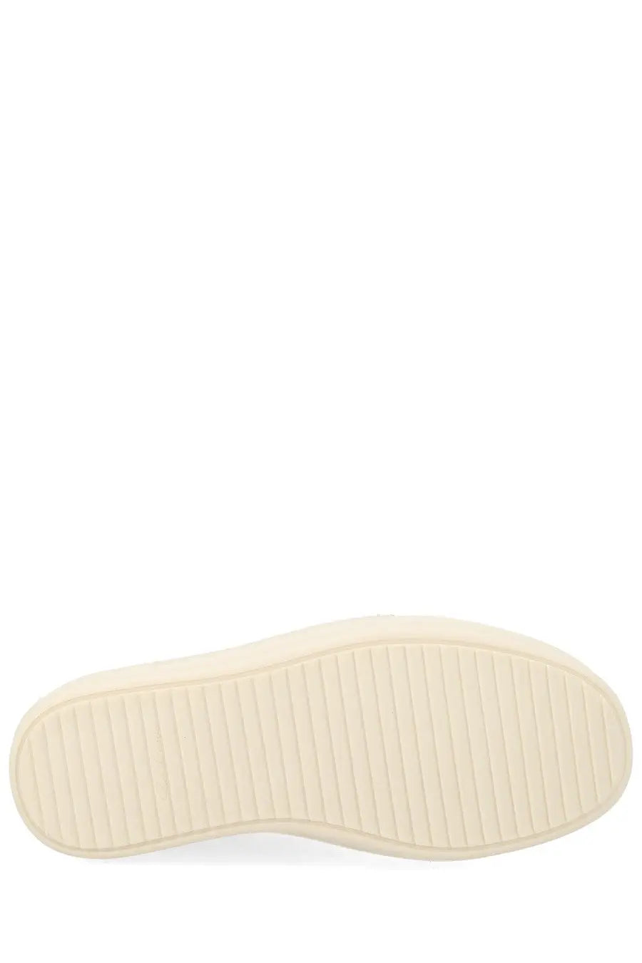 Cream-colored rubber sole with textured ribbed pattern on the Rick Owens women’s sneaker vintage sneaks white back side