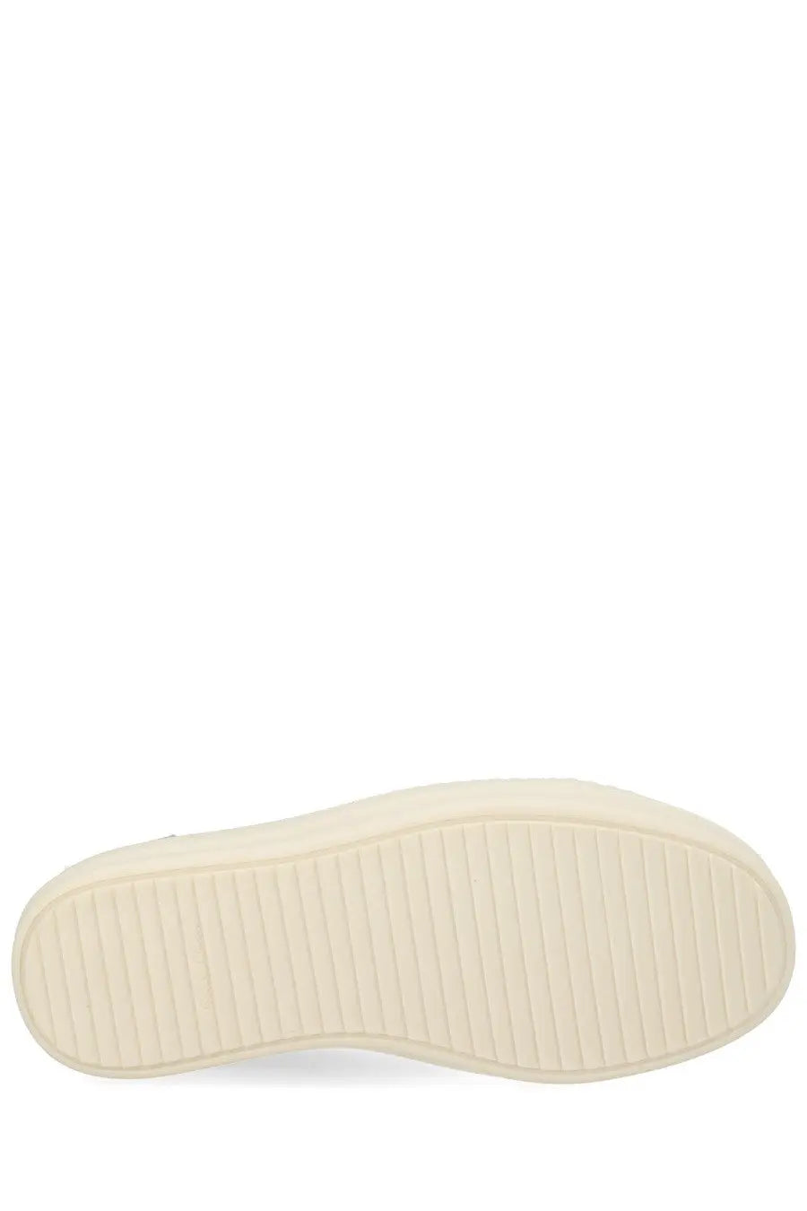 Cream-colored rubber sole with textured ribbed pattern on rick owens women vintage sneaks sneaker beige back side