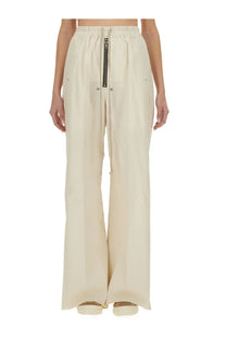 Cream-colored wide-leg trousers by Rick Owens featuring a drawstring waist and front zipper detail for women