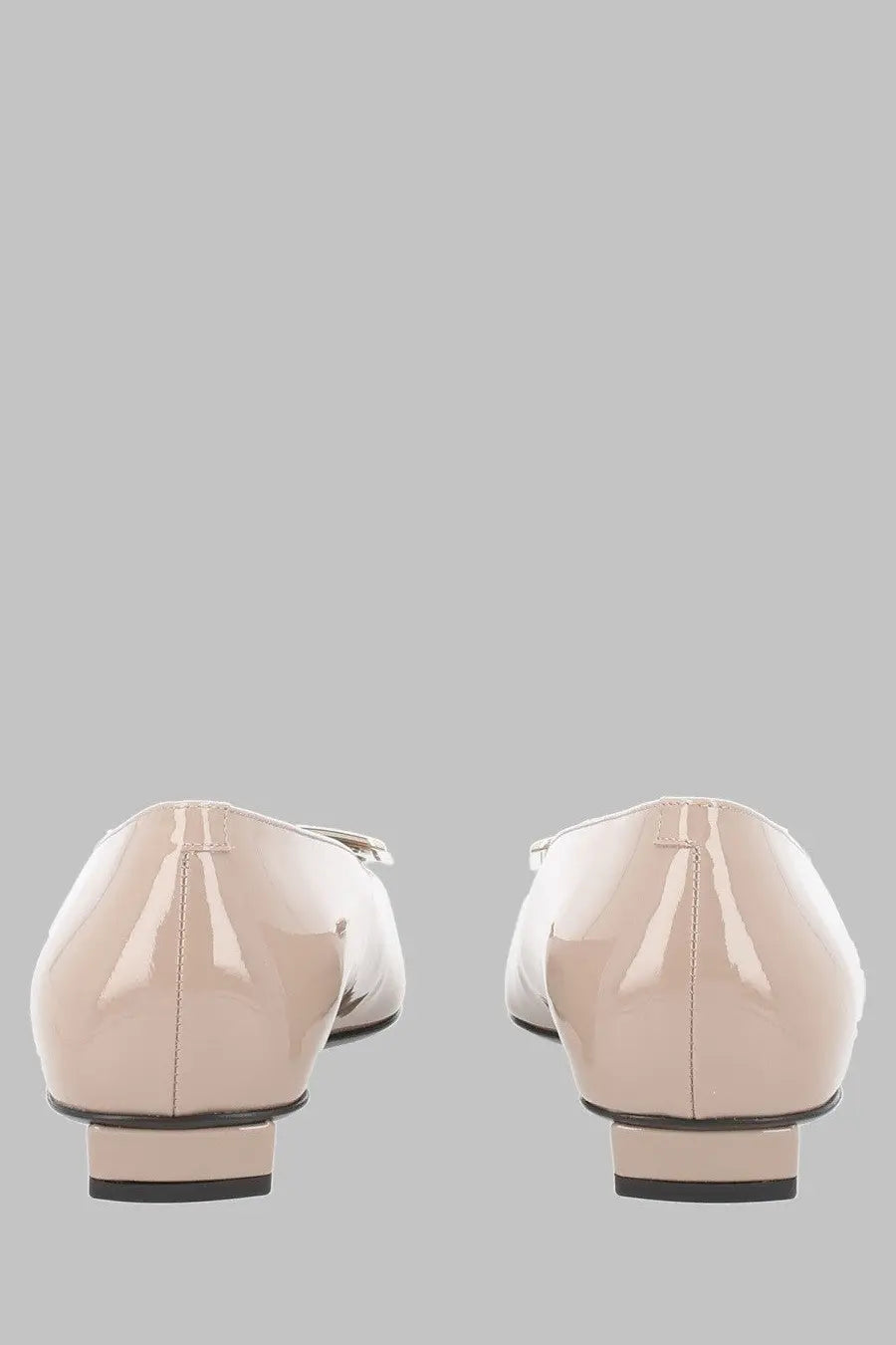Beige patent leather roger vivier ballerina belle vivier flats showing the back with small metallic buckle detail