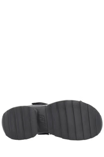 Back view of roger vivier women’s sandalo viv on the run black with black rubber sole and ribbed textured pattern