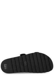 Back view of roger vivier womens slidi viv sandal green showing black rubber sole with ribbed texture and logo near heel