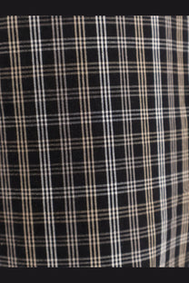 Black plaid madras cotton fabric with thin white and beige lines for rohe womens trousers black