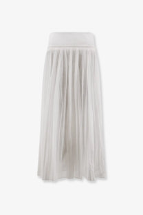 A flowing white pleated cotton midi skirt with lightweight fabric and elastic waistband from Rohe women’s collection