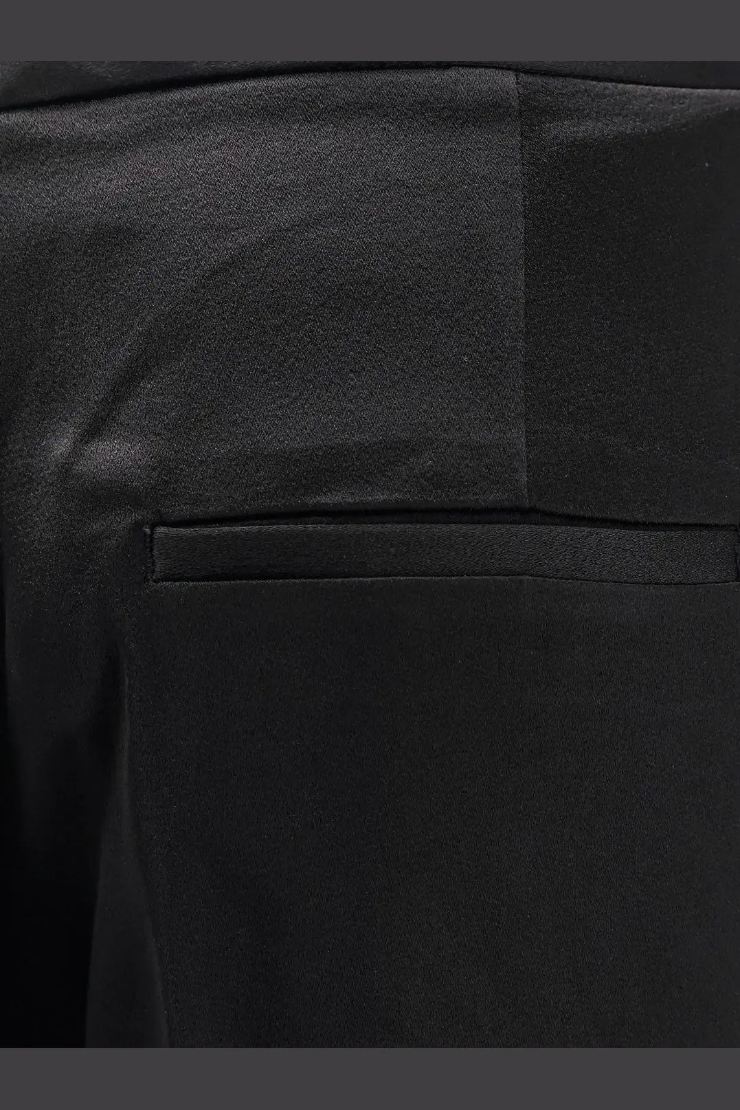 Rohe women’s relaxed satin trousers in black featuring sleek satin fabric with smooth texture and subtle sheen