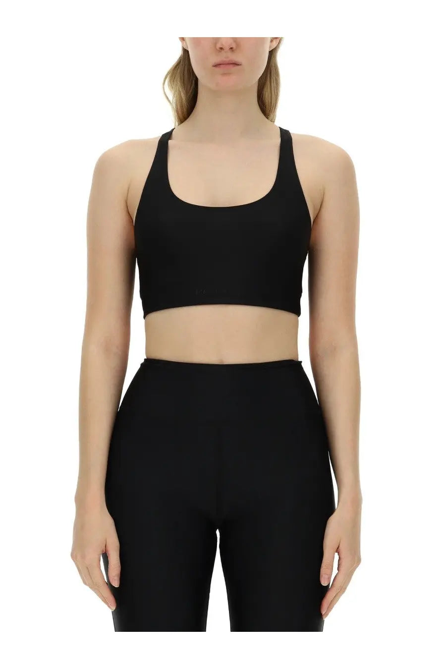 Black seamless sports bra with wide shoulder straps and scoop neckline from rotate birger christensen womens crop top