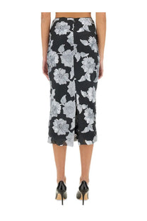 Rotate Birger Christensen women’s black midi pencil skirt with delicate white floral pattern and subtle ruffled hem
