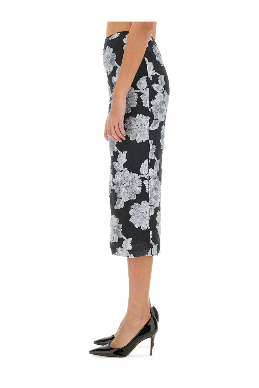 Black midi pencil skirt by Rotate Birger Christensen with bold white floral pattern on black fabric