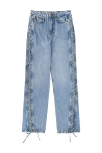 Rotate Birger Christensen women’s light-wash denim jeans with intricate lace-up outer seams and adjustable ankle drawstrings