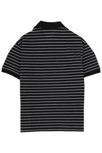 Rotate Birger Christensen women’s polo black is a black and white striped short-sleeved cotton shirt with a classic collar