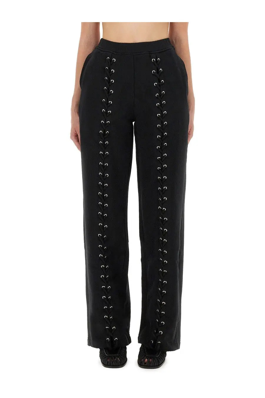 Rotate Birger Christensen women’s black high-waisted sports pants with silver eyelets and lacing down each leg