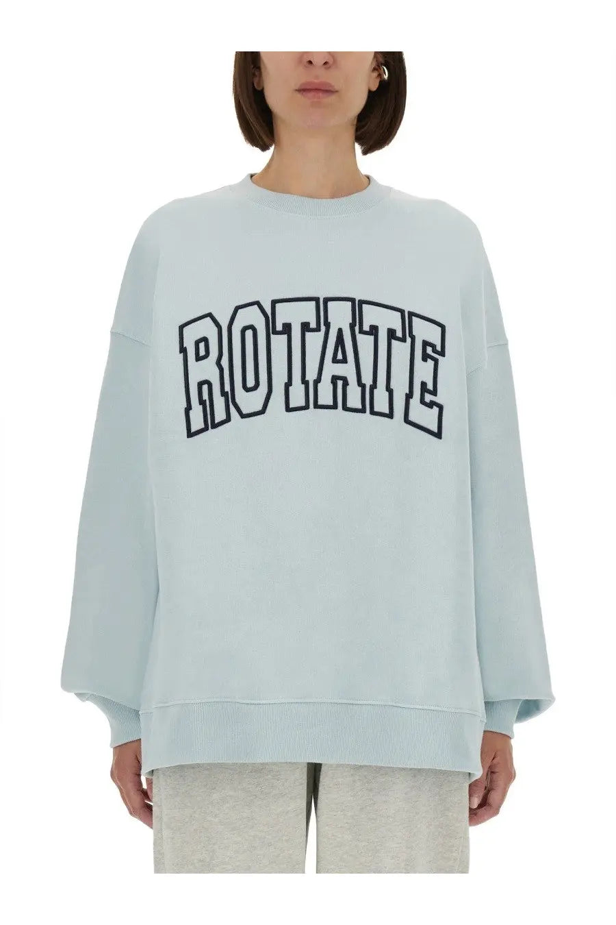 Light blue oversized Rotate Birger Christensen women’s sweatshirt with bold black rotate lettering across the chest