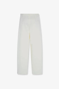 Cream-colored wide-leg trousers with smooth flowing fabric and minimalist design by the row in cotton and silk