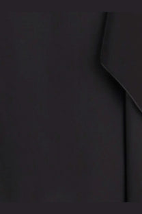 The row women’s koray silk top black showing smooth matte black silk fabric with subtle creases