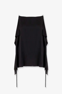 The Row women’s Koray silk top in black features an off-the-shoulder design with flowing layered sleeves and an asymmetrical hemline