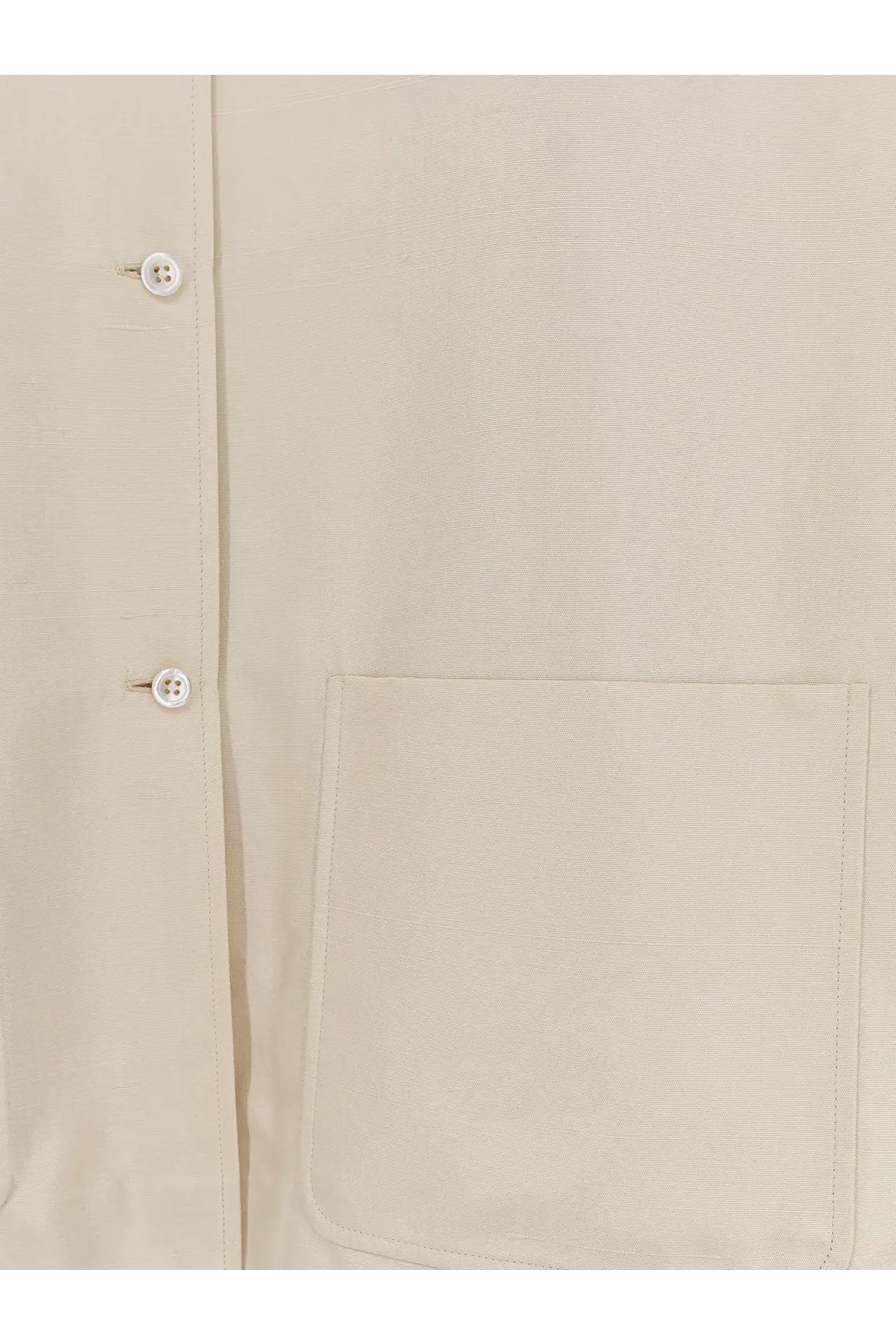 The row women’s lucetta silk shirt white beige button-up with subtle texture and white buttons front view