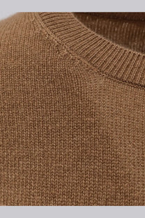 The row women’s noler cashmere sweater beige with a cozy camel-colored knit and ribbed crew neckline