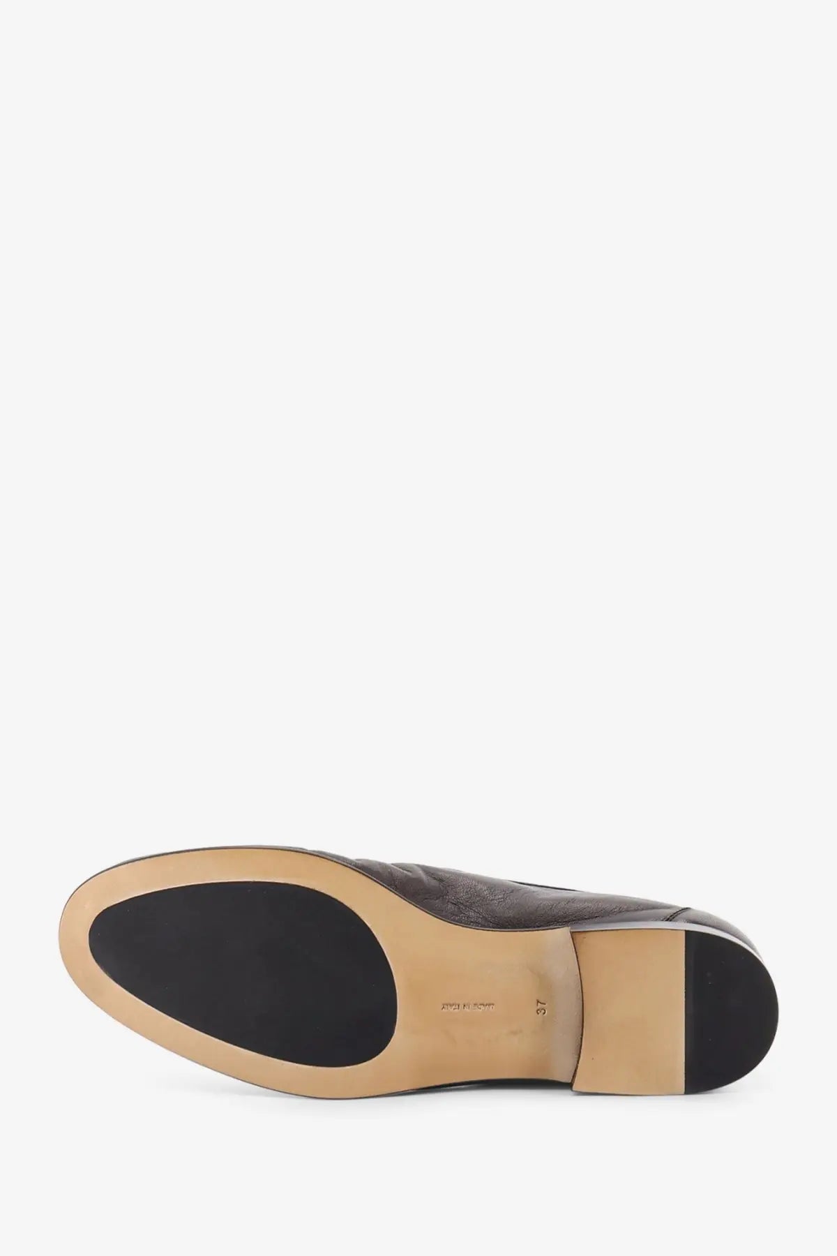 The row women’s soft mocassin two leather loafers in brown feature dark brown leather oxford style with tan rubber sole and black heel cap