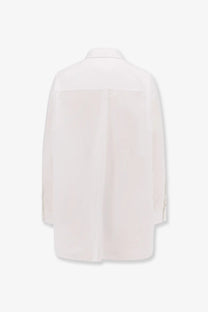 The row womens victoria cotton shirt white is a minimalist white button-up with tailored silhouette and vertical seam detailing