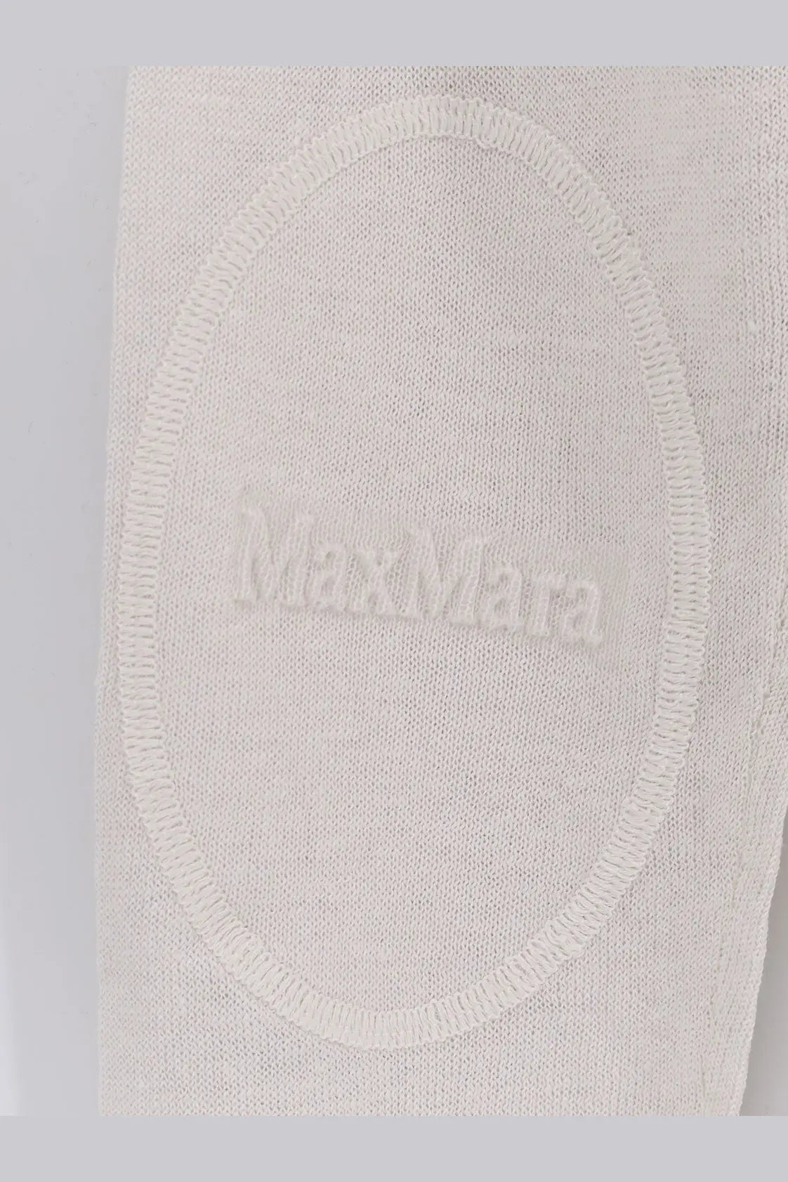 White knit fabric patch with max mara embroidered in raised thread on s max mara women’s smmfervore linen sweater white