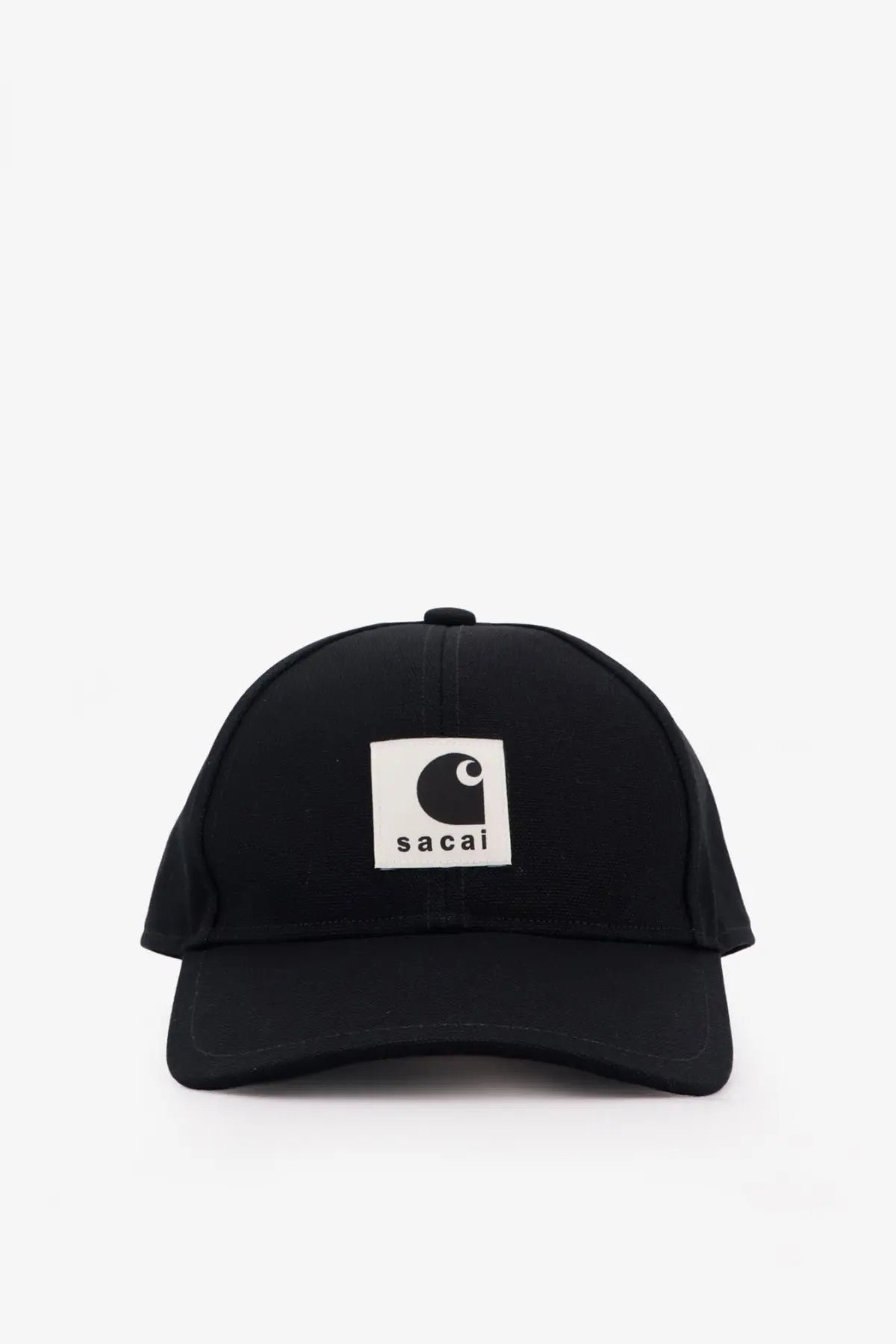 Sacai men’s black carhartt wip duck baseball hat with white patch featuring black curved c logo and sacai text