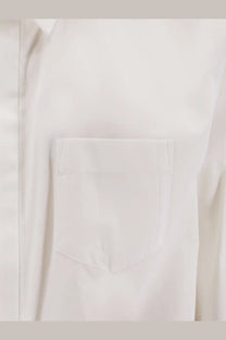Sacai women’s oversize white cotton shirt with a neat stitched chest pocket and subtle fabric texture