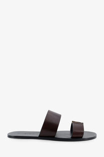 Saint Laurent men’s Babylone dark brown leather slide sandal with minimalist design and black rubber sole