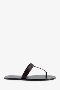 Saint Laurent men’s babylone dark brown leather thong sandal with minimalist design and black sole front view