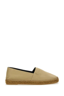 Beige leather Saint Laurent men’s espadrille slip-on shoe with braided jute sole and subtle brand logo on the side