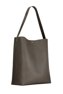Saint Laurent men’s hobo bold bag in sleek olive green leather with a single shoulder strap and subtle branding