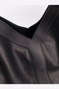 Saint Laurent men’s oversize black leather shoulder bag with minimalist stitching and structured design