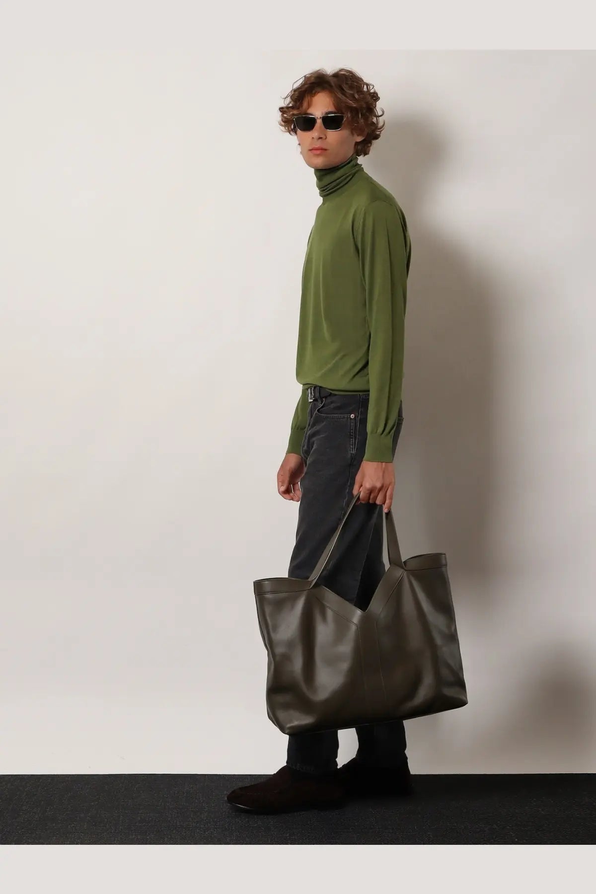 Saint Laurent men’s oversize olive green leather tote bag with structured handles and minimalist design