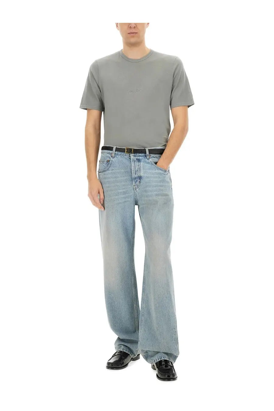 Light-wash denim jeans with relaxed wide-leg cut and classic five-pocket design paired with saint laurent men’s shirt con grey