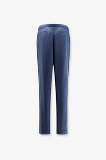 Saint Laurent men’s silk trousers in navy blue with a sleek straight-leg cut and rolled cuffs