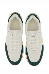 Saint Laurent men’s smooth leather SL sneaker in white with green suede accents and a clean minimalist design