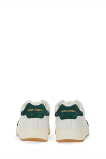 Saint Laurent men’s smooth leather white sneakers with green suede heel tabs and gold lettering shown from the back