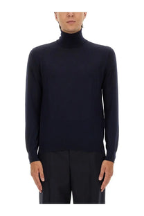 Saint Laurent men’s navy blue turtleneck pullover with smooth fine-knit texture perfect for stylish layering