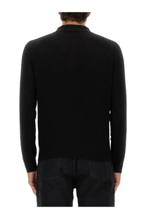Saint Laurent men’s black wool polo shirt with long sleeves classic collar and smooth uniform fabric
