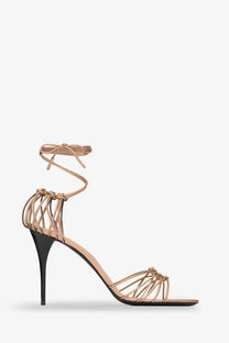 Saint Laurent women’s babylone beige leather strappy sandal with black stiletto heel and crisscross ankle tie