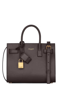 Dark brown leather Saint Laurent Paris handbag with gold-tone hardware and matching lock Sac de Jour Nano Green model