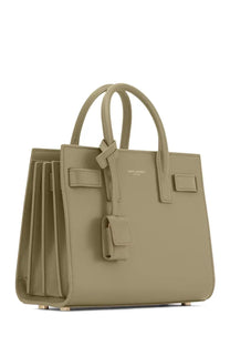 Saint Laurent women’s green leather mini bag sac de jour nano with structured handles and signature flap closure