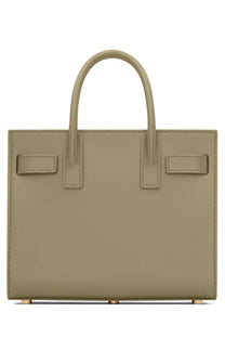 Saint Laurent women’s sac de jour nano tote bag in olive green leather with structured handles and gold hardware