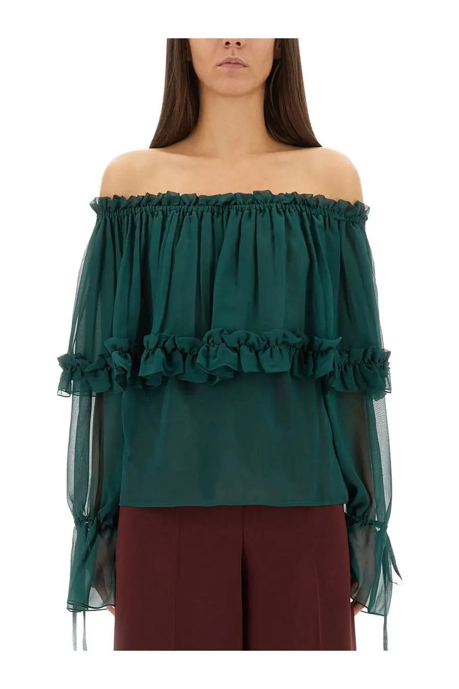 Saint Laurent women’s emerald green silk off the shoulder blouse with layered ruffles and sheer long sleeves