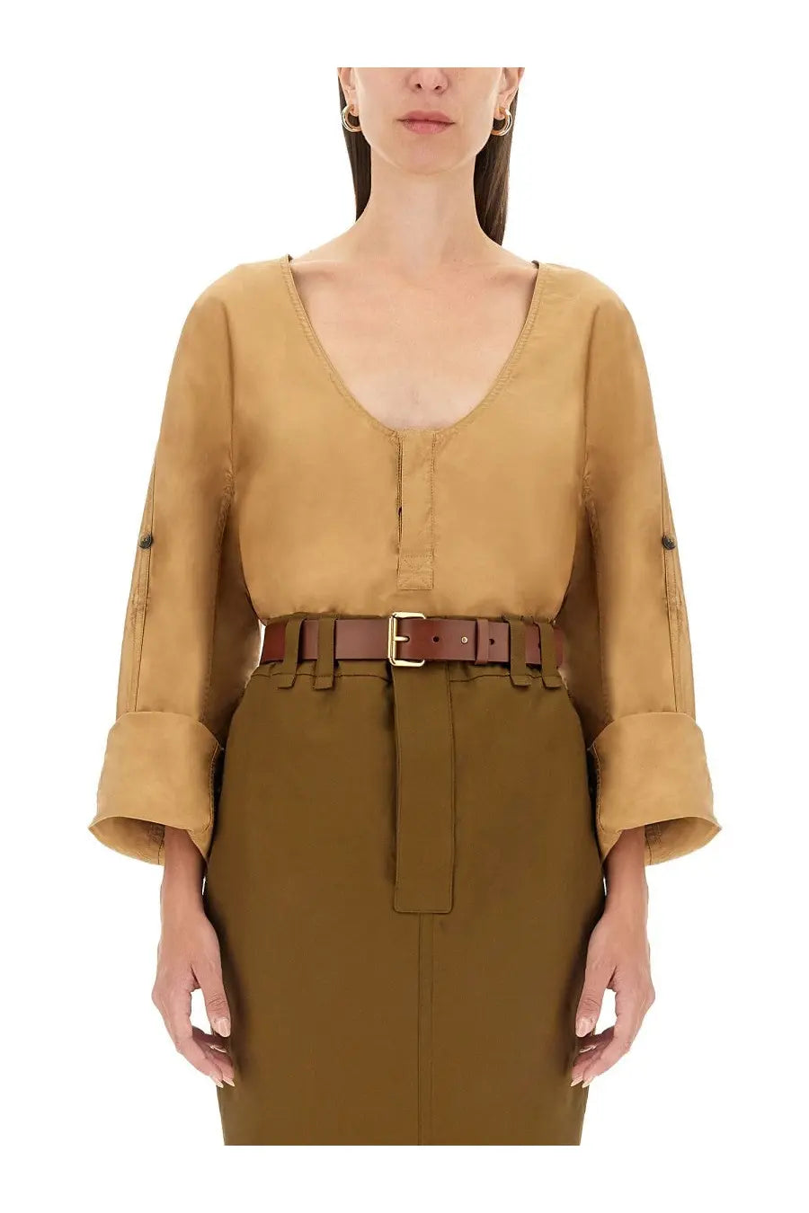 Tan belted Saint Laurent women’s blouse with rolled cuffs and v-neckline in beige for stylish casual wear